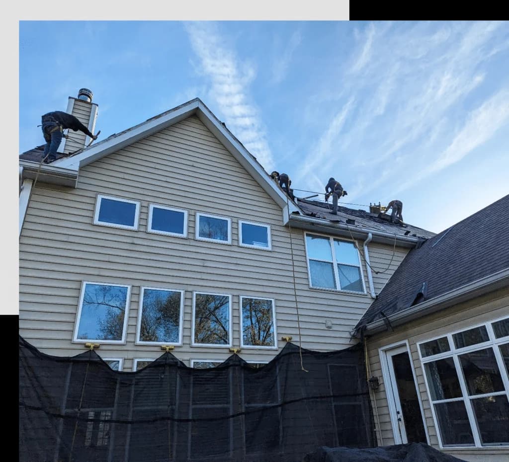 Roofers Installing a New Roof on a Home