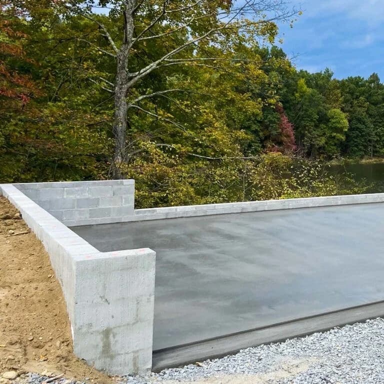 A concrete foundation installation for a garage or shed