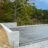 A concrete foundation installation for a garage or shed