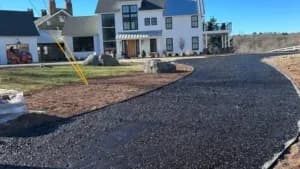 Newly installed chip seal driveway from J. Hunziker Asphalt Paving