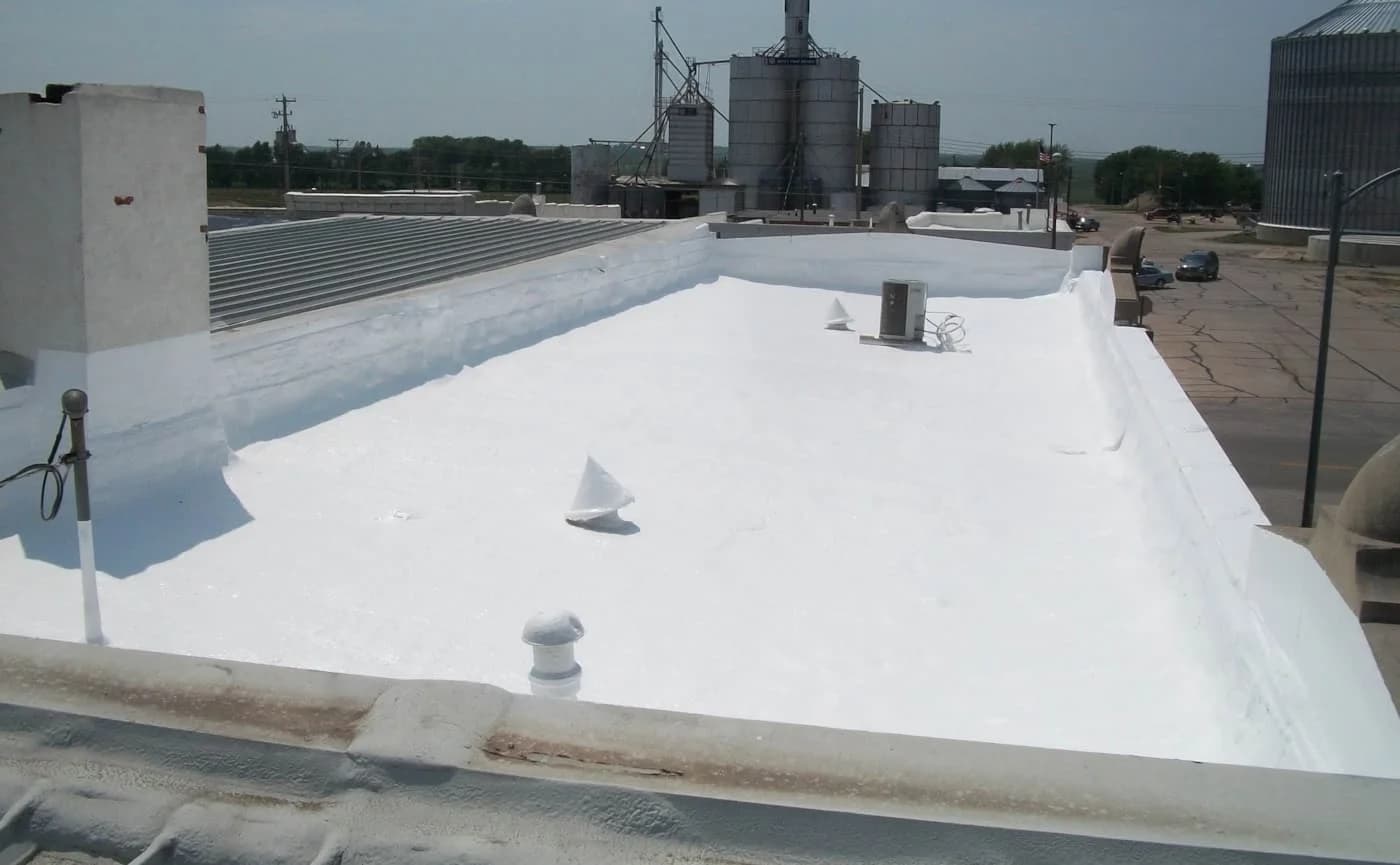 Completed spray foam roofing project by A&M Contractors Inc.