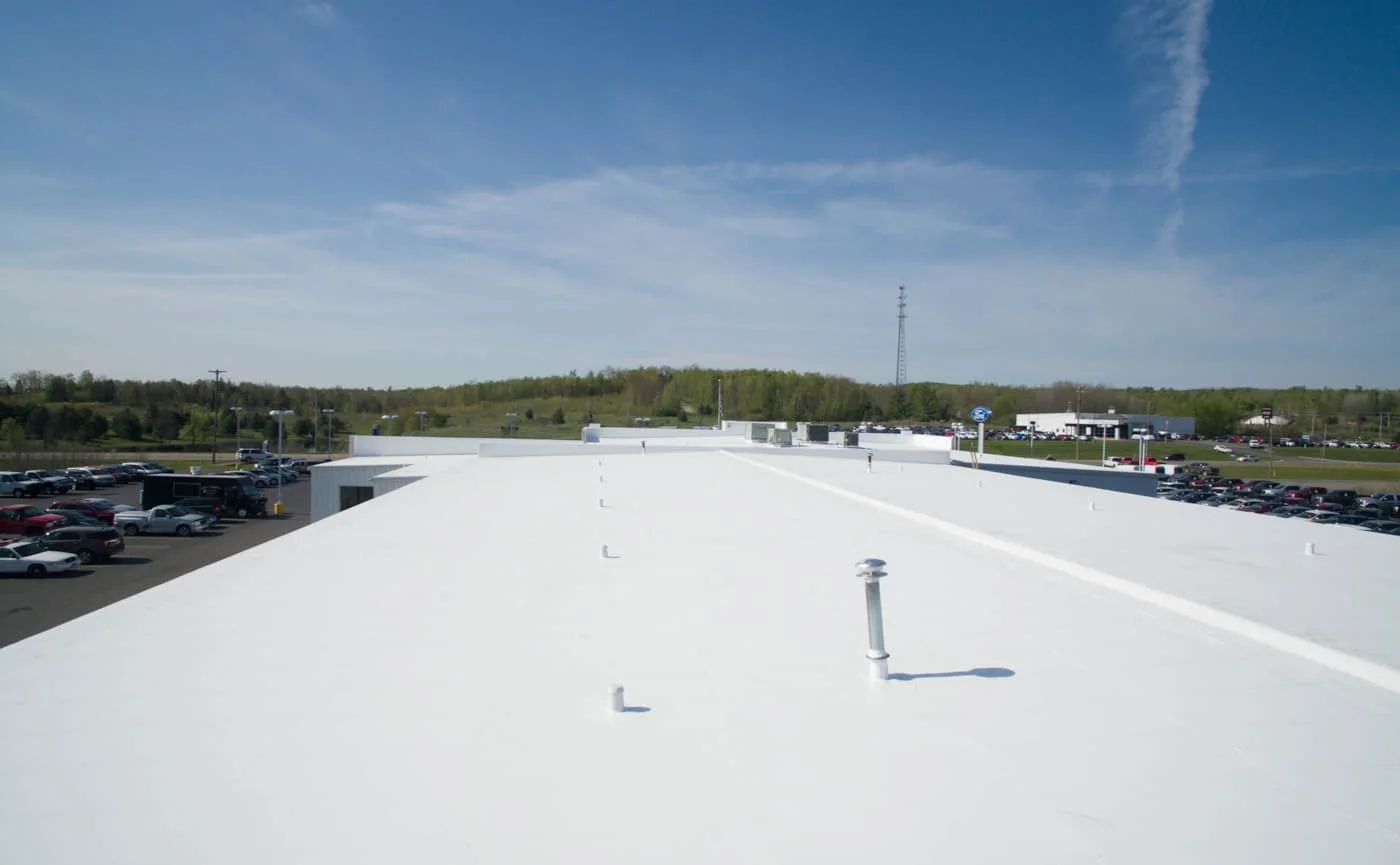 Completed commercial roofing project by A&M Contractors.