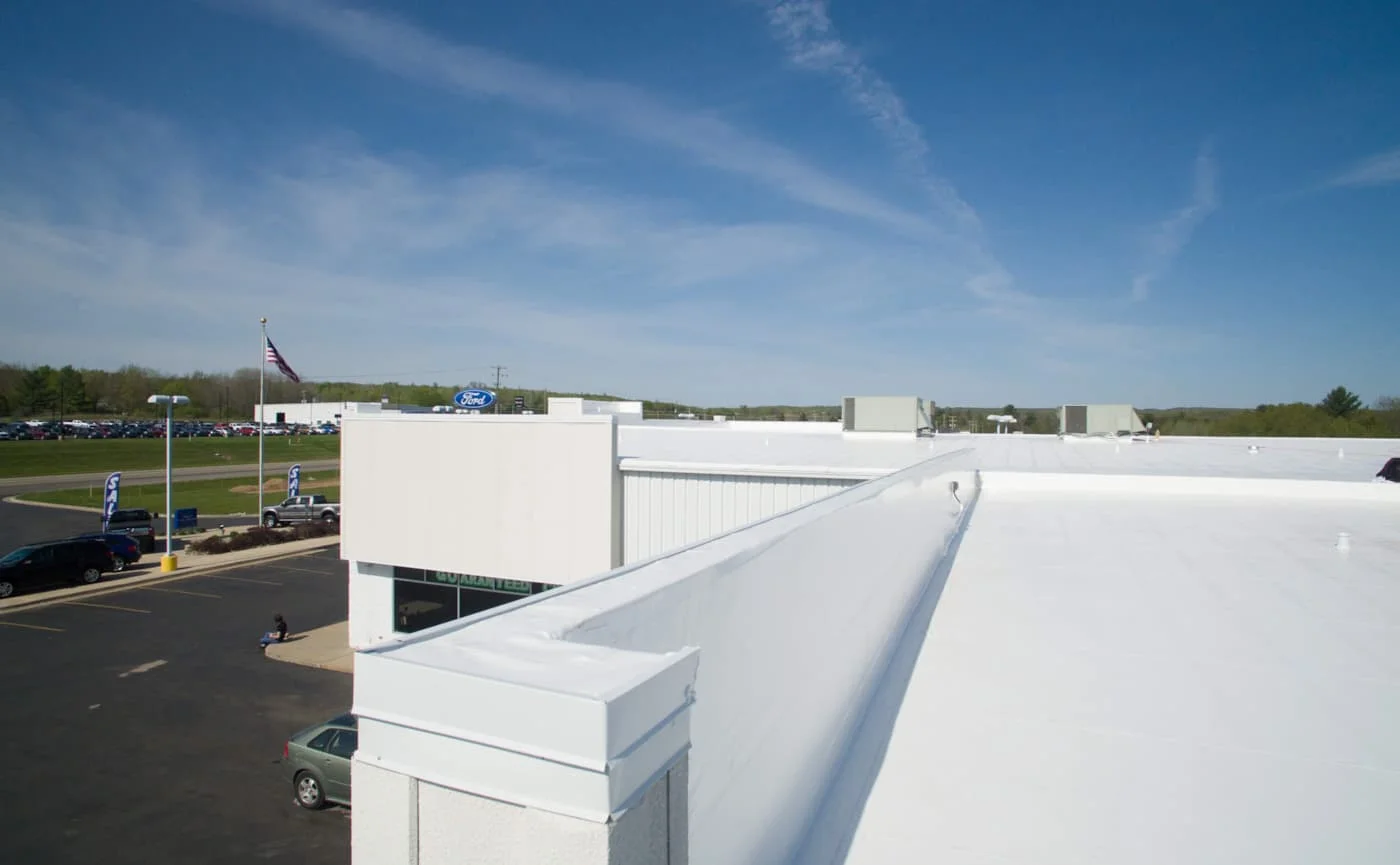 Completed commercial roofing project by A&M Contractors.