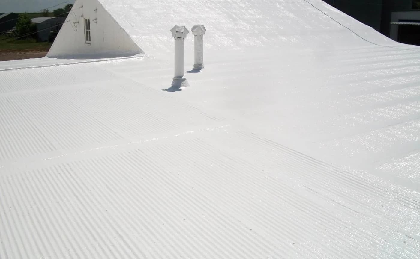 Completed spray foam roofing project by A&M Contractors Inc.
