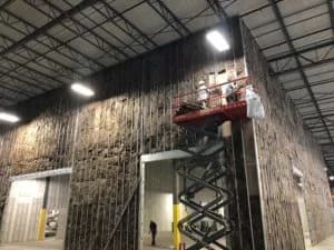 Insulating-office-building-in-warehouse