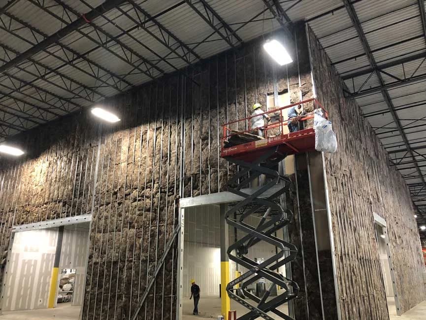 Insulating-office-building-in-warehouse