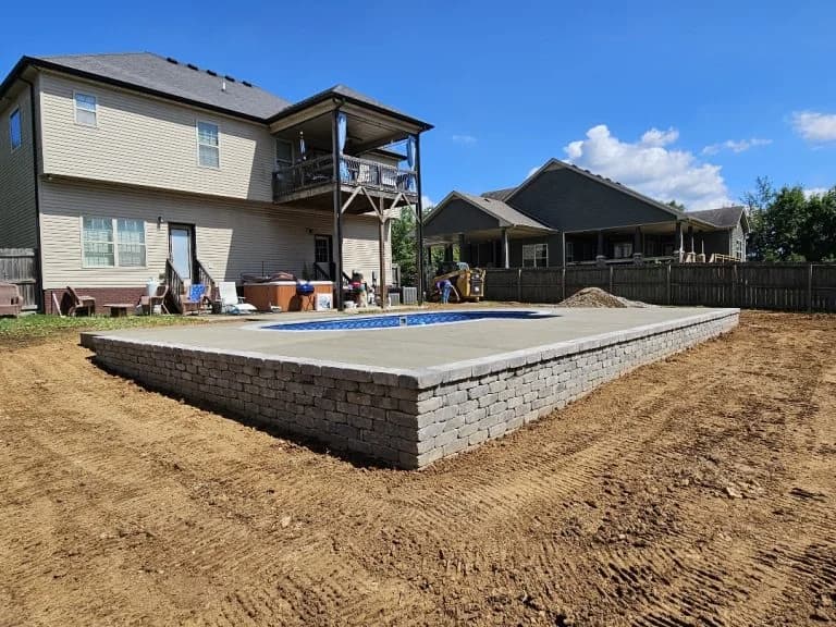 concrete pool deck with retaining wall in Nashville TN - The Concrete Gentlemen