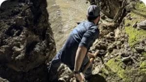 Reliant Plumbing worker fixing leak at jobsite