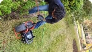 Plumbing worker using a Plumbing camera for an inspection