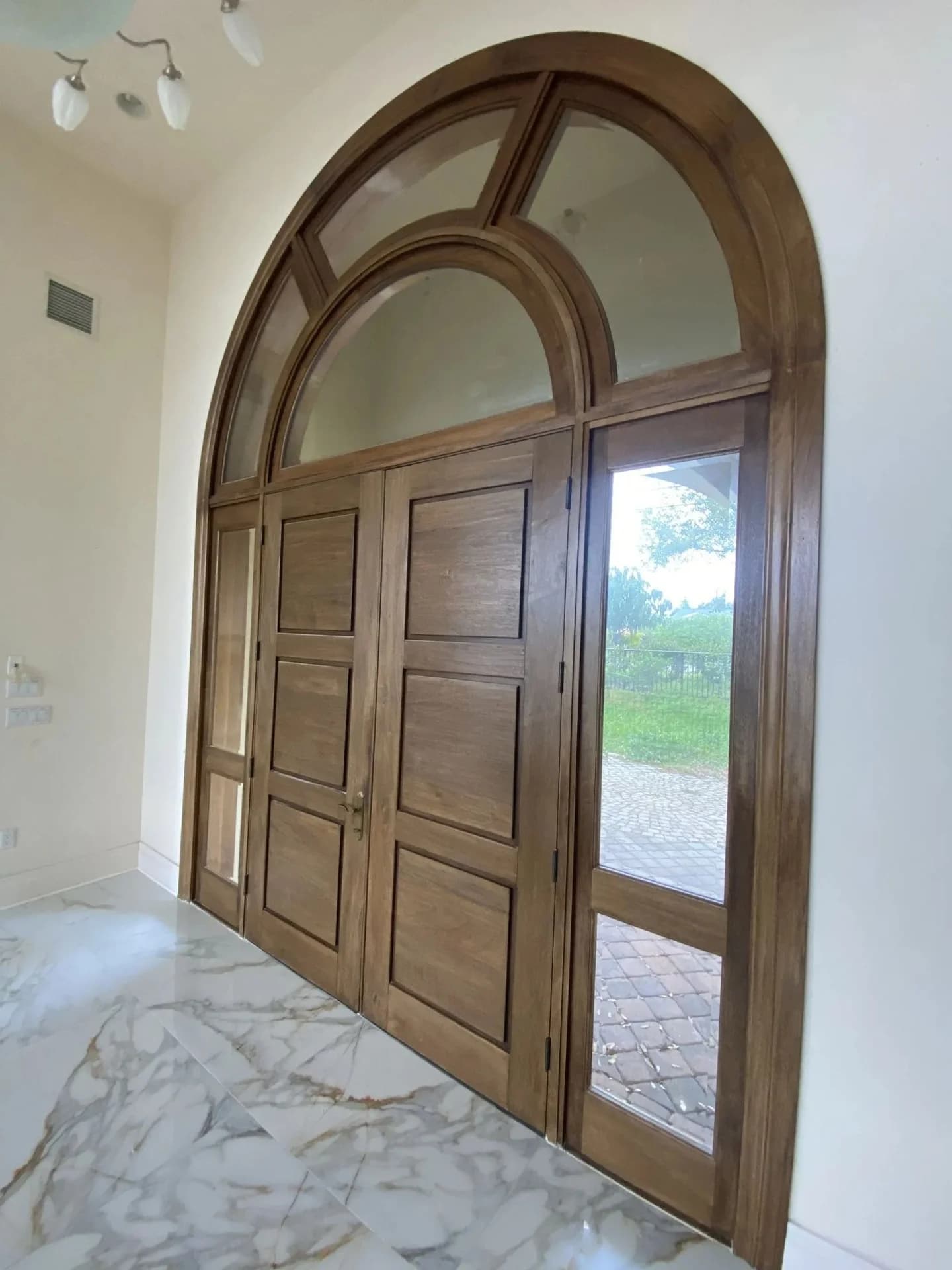 Huge door and a freshly painted wall