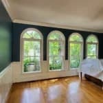 Dark blue living room painting in the North Ridge neighborhood in Raleigh, after removing the wallpaper.