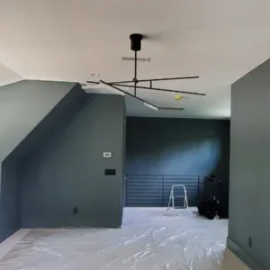 A finished ceiling in a bonus room after removing a textured popcorn ceiling.