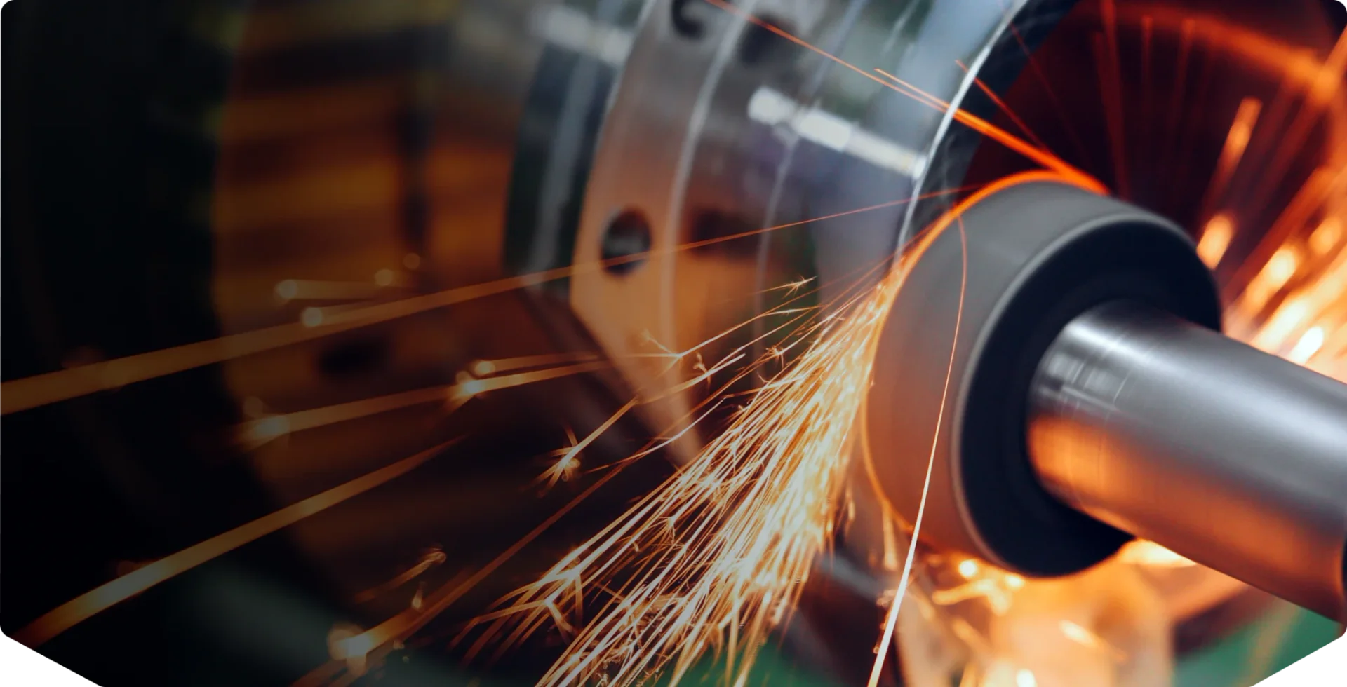 Metal grinding sparks, industrial process.