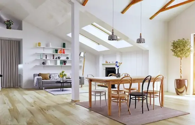 Modern, open dinning/living area with wide plank flooring