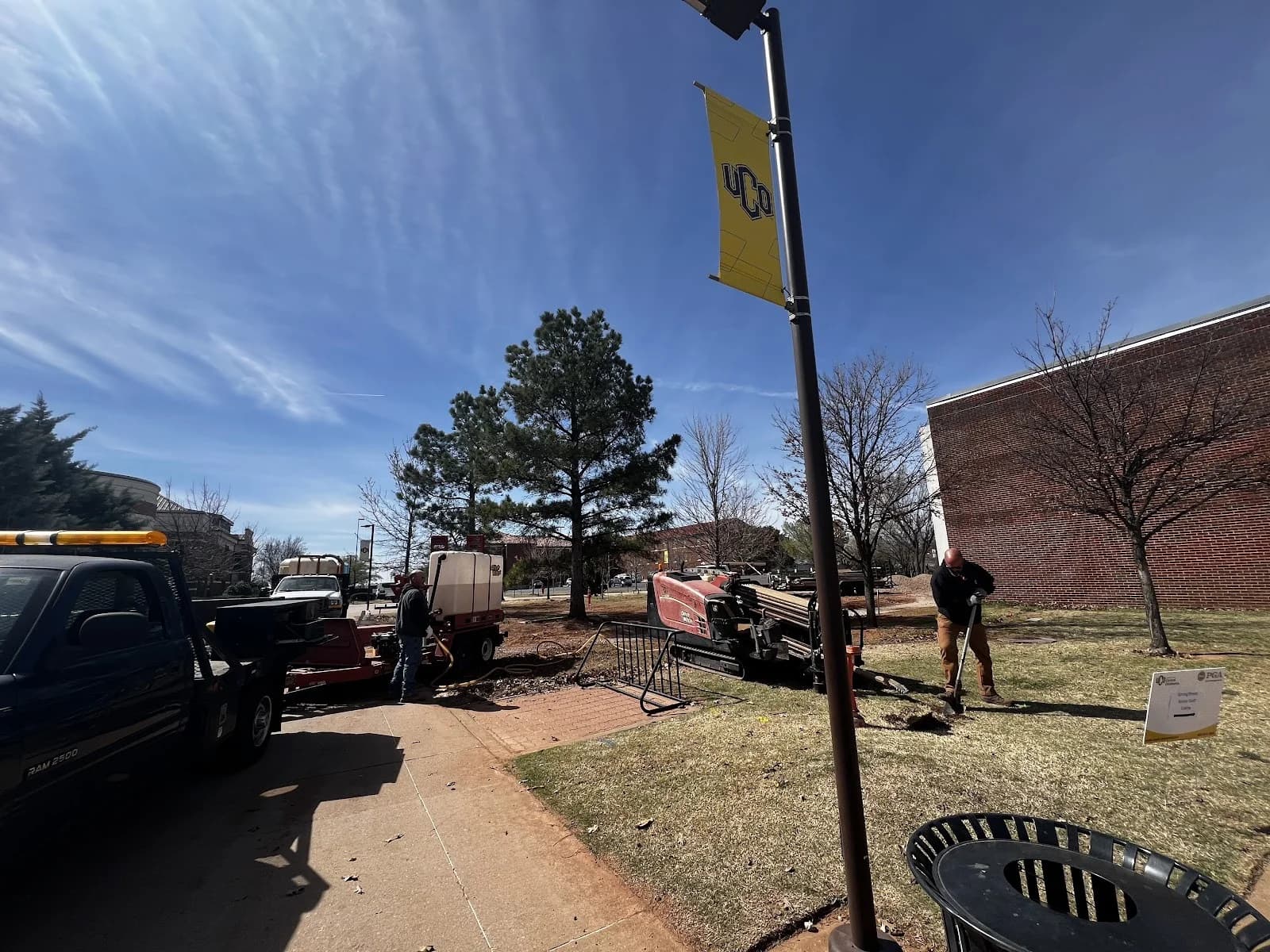 Trinity Boring Solutions directional boring UCO university campus Edmond Oklahoma HDD crew sidewalk trenchless utility installation