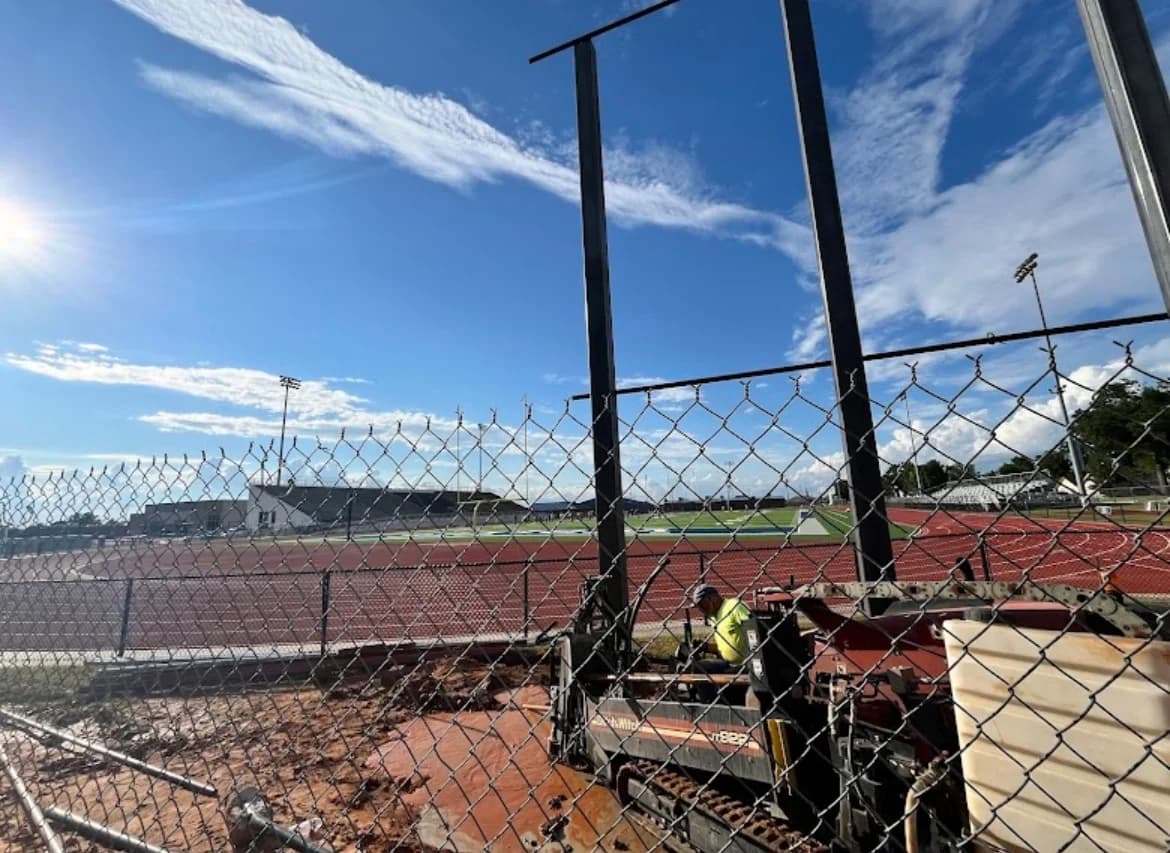 Trinity Boring Solutions track stadium boring project underground conduit Oklahoma