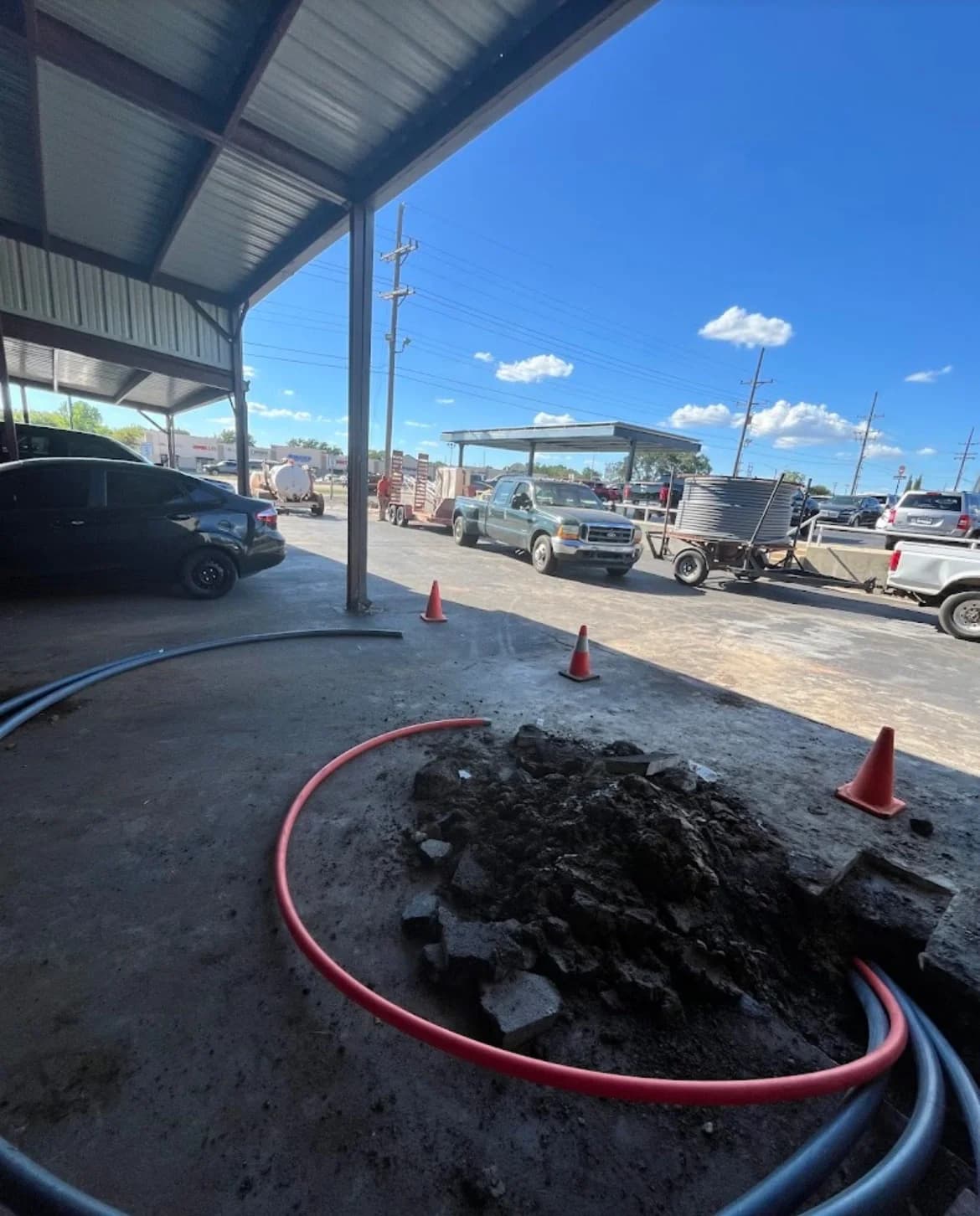 Trinity Boring Solutions directional boring crew orange traffic cones construction zone Oklahoma City HDD utility contractor safety