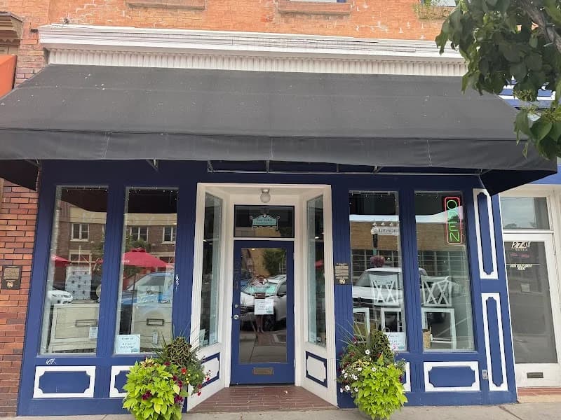 Four Sisters Furniture, Custom Framing & Gifts portfolio photo