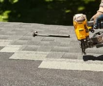 Logan Roofers repairing a roof in Logan Utah