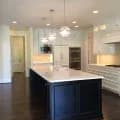 navy blue cabinet with white trims