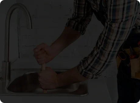 Emergency plumbing technician from B&L Plumbing fixing a leak in Colorado Springs, ensuring reliable service.