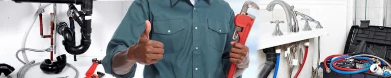 Plumber holding wrench