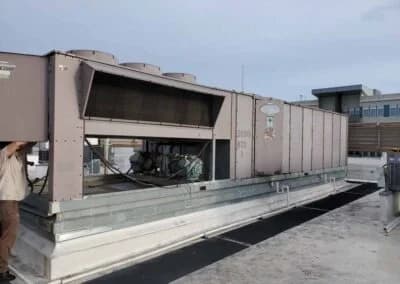 Old Packaged Unit Being Disconnected for Removal by CMS