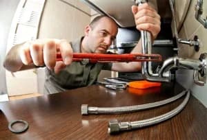 portrait of caucasian plumber at work