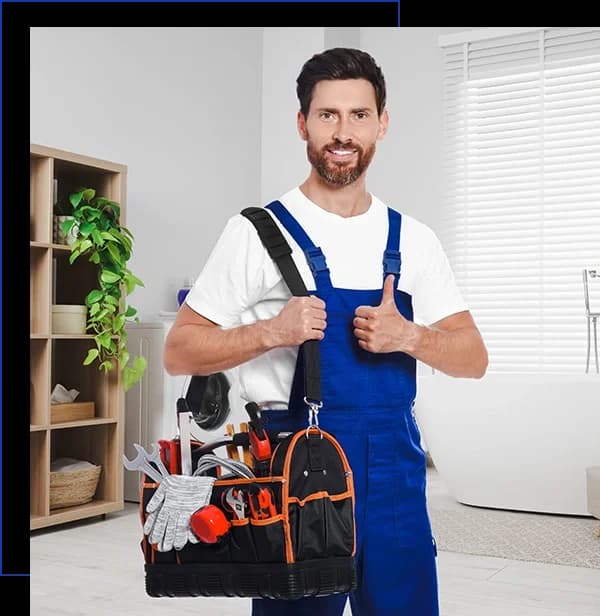 Plumber with bag of instruments showing thumbs up in bathroom