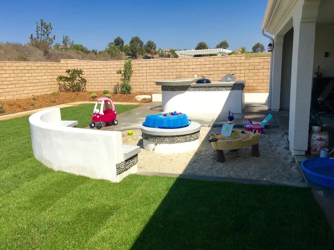 Outdoor kitchen and BBQ island built by Arcadian Landscape