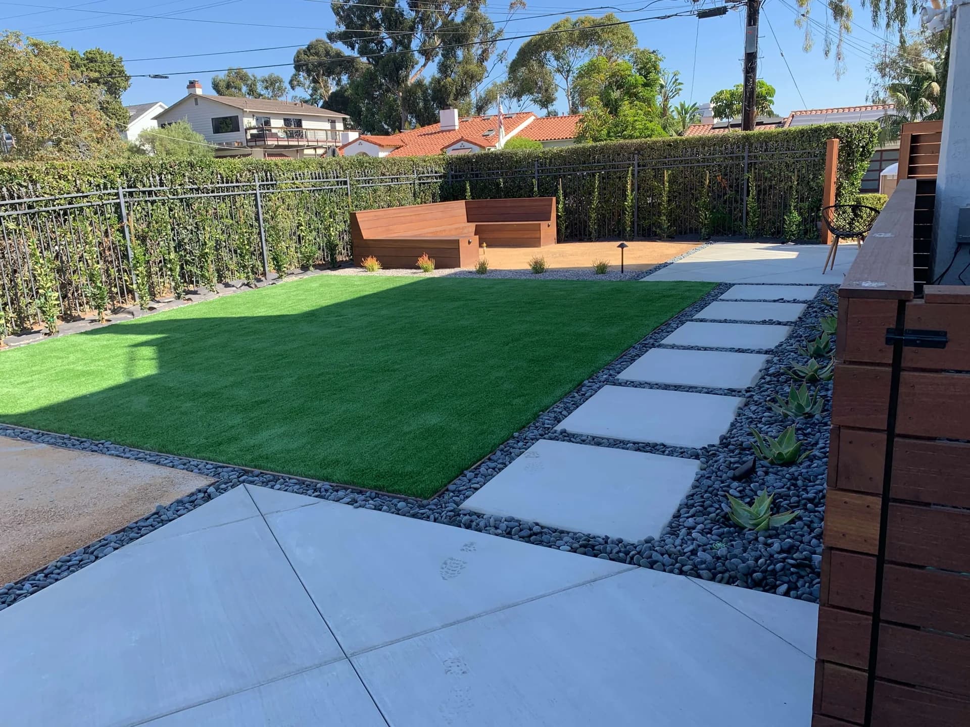 Modern paver walkway with artificial turf in San Diego