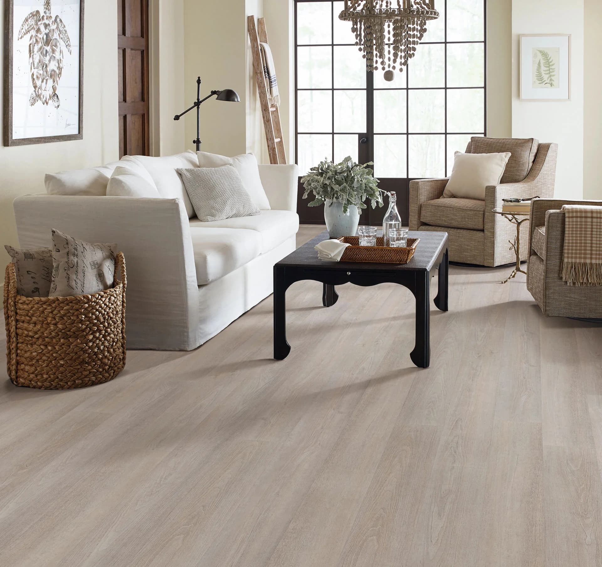 light gray hardwood flooring of a living room with nice furniture present