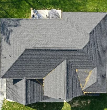 Aerial view of house in Indianapolis after recent roof repairs.