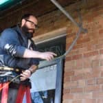 Electrician running cables