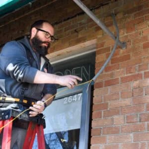 Electrician running cables