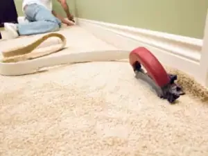 Professional carpet installation in a Los Angeles bedroom, creating a soft and comfortable living space.