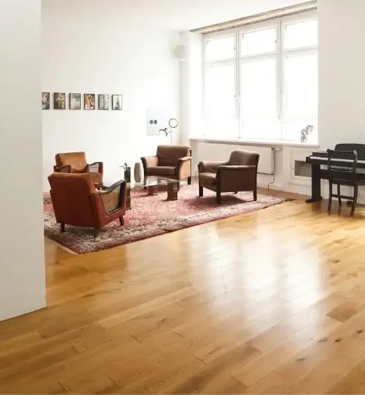 Hardwood floor installation completed in a guest room of a Santa Monica home with natural wood floor finish.