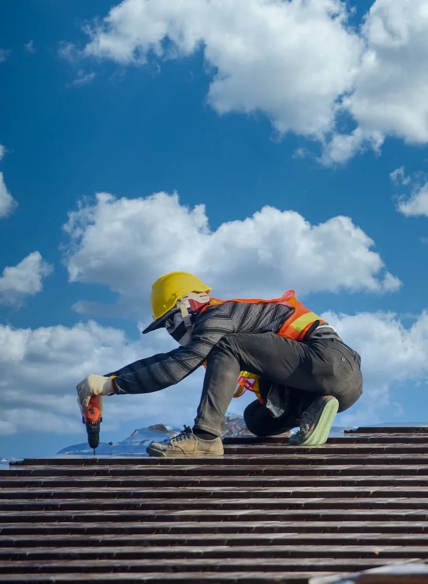man installing roof