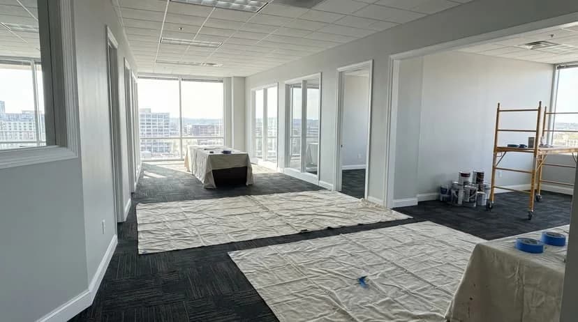 Freshly painted modern commercial office interior with light gray walls and white trim in Nashville, TN