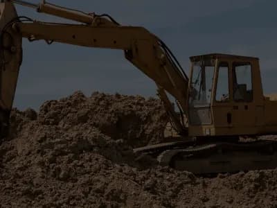 Image of a Construction Vehicle Moving Dirt