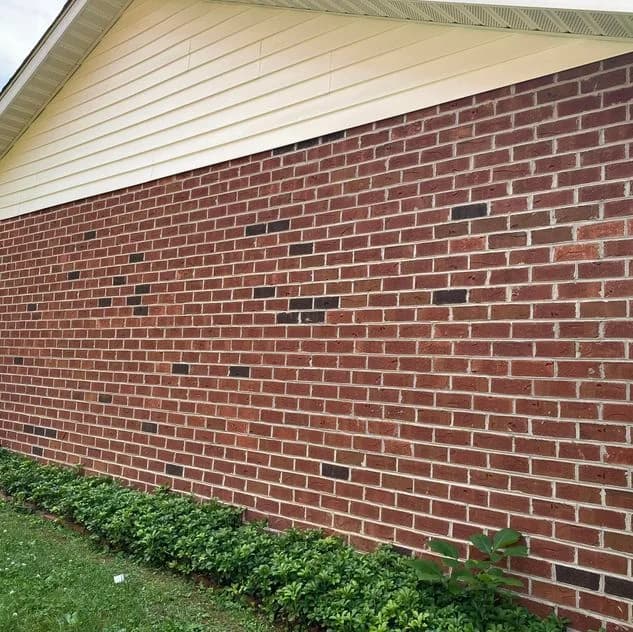 An exterior siding painting project for a residential home using our air-assisted sprayer.