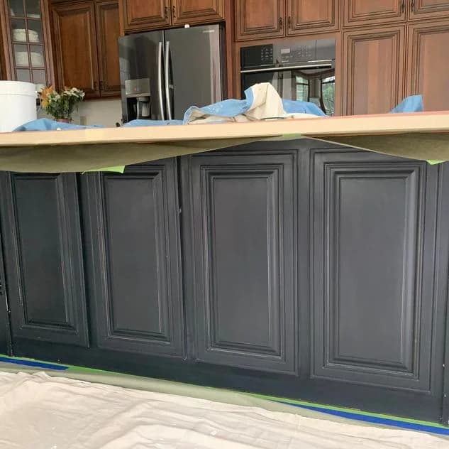 We added a nice slate black paint to this kitchen island to help it stand out.