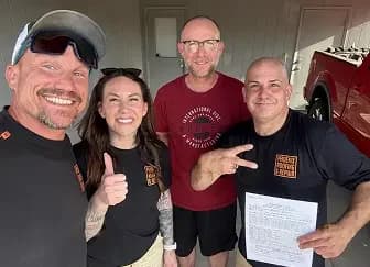 roofing expert team with a happy client