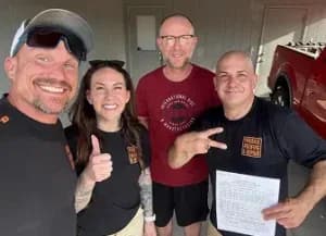 roofing expert team with a happy client