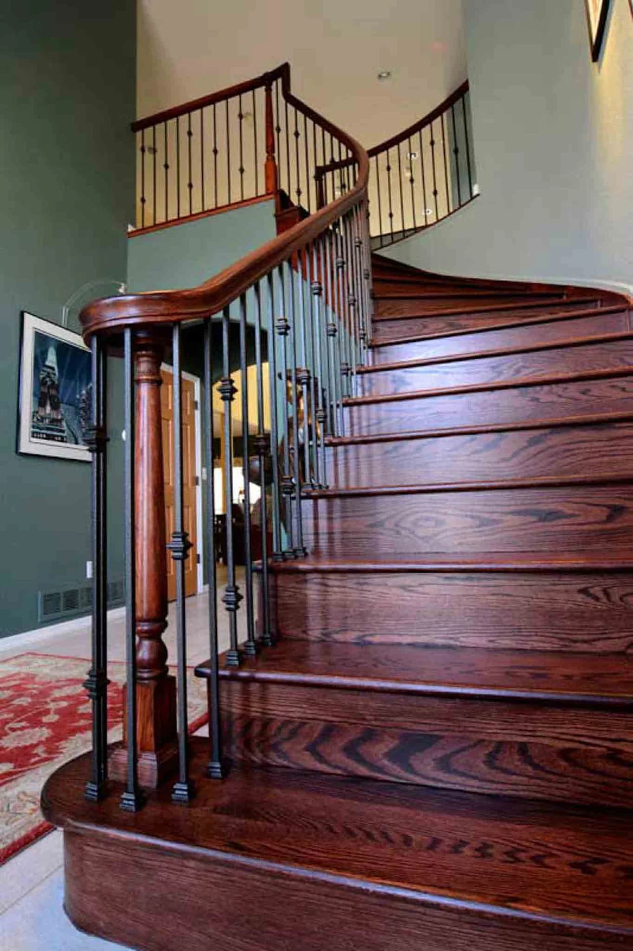 A staircase with dark wood.