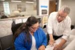 Electricians going over plans in an office