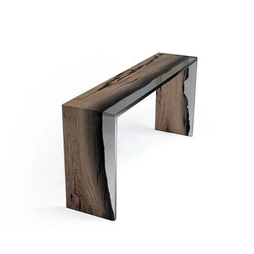 Wetland One Side Console highlights raw wood framed in crystal-clear resin. Its elongated form and asymmetrical detailing balance organic beauty with sharp contemporary lines.