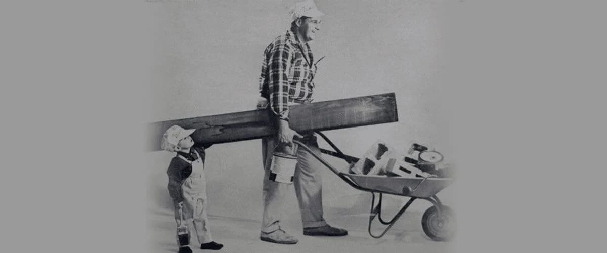 Mr. Wiese With his son moving painting equipment.