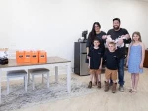 Twisted Floors Family inside of Showroom