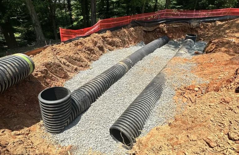 Corrugated pipe installation for stormwater or sanitary sewer drainage.